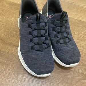 Skechers Black Sneakers with Sleek Design and Breathable Knit